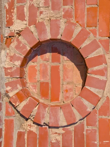 Ziegelwand runde Kreis Details Hintergrund. — Stockfoto