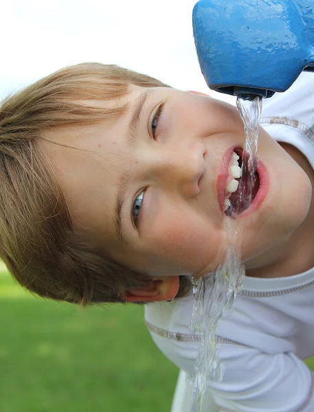 stock image Thirsty young boy closeup