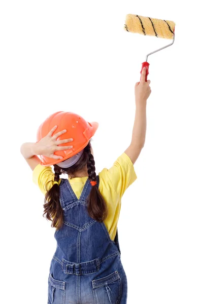 Girl in overall with paintroller — Stock Photo, Image