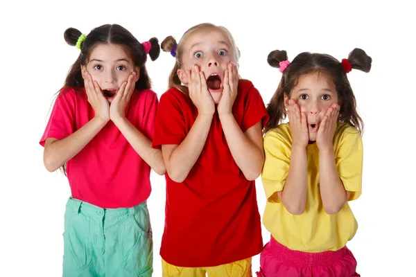Tre förvånad små flickor — Stockfoto