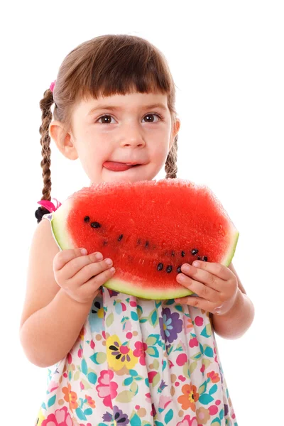 Litle meisje eten een watermeloen — Stockfoto
