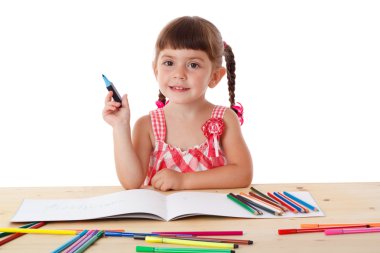 Little girl draw with crayons clipart