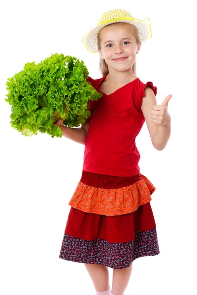 Gülümseyen kız marul salatası ile — Stok fotoğraf
