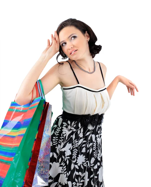 Portret van een gelukkig jong volwassen meisje, met kleurgecodeerde tassen. — Stockfoto