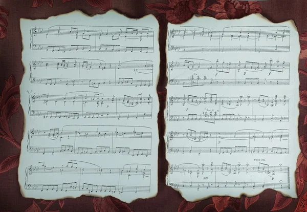 Сторінка старовинної музичної книги — стокове фото
