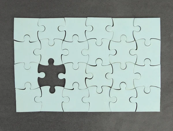 Piece missing from jigsaw puzzle — Stock Photo, Image