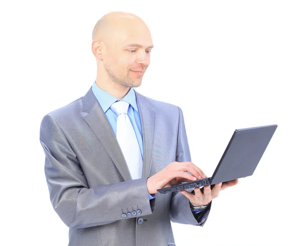 Mann mit Laptop auf weißem Hintergrund — Stockfoto