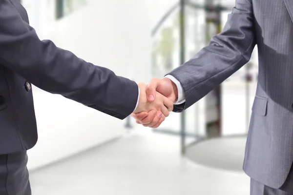 Handshake businessmen in the office. — Stock Photo, Image