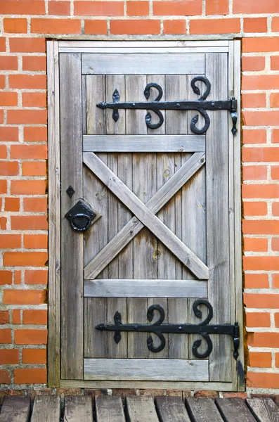 Old wooden door in the castle — Stock Photo, Image