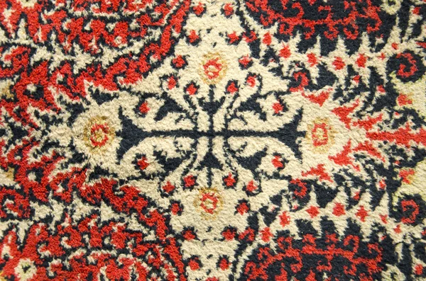 Old and ornamental carpet background — Stock Photo, Image