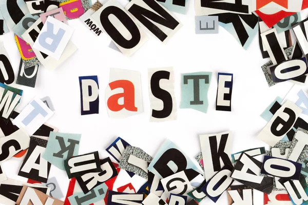 Paste inscription made with cut out letters — Stock Photo, Image