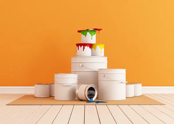 Cepillo y latas de pintura en cartón —  Fotos de Stock