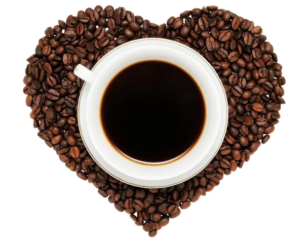 Tazza di caffè su cuore da fagioli di caffè — Foto Stock
