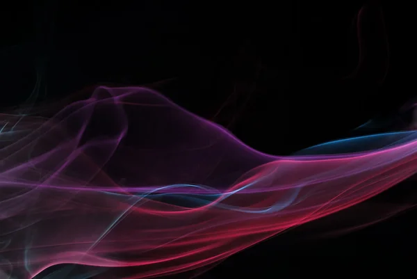 Разноцветный дым на черном фоне — стоковое фото