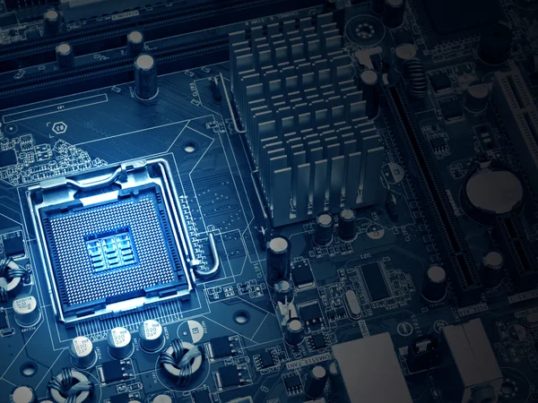 PC motherboard closeup, blue tone — Stock Photo, Image