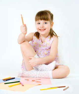 Cute child draw with colorful crayons and smile, isolated over w clipart