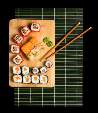 Japanese sushi traditional Japanese food. Roll made of Smoked clipart