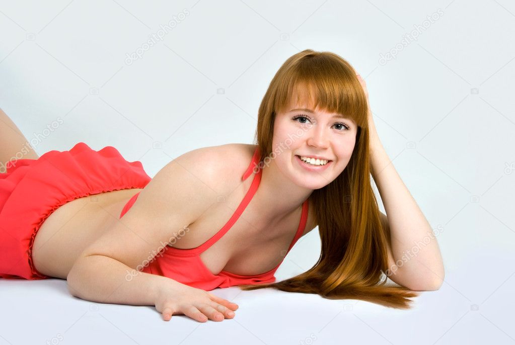 Beautiful redheaded woman in a swimsuit