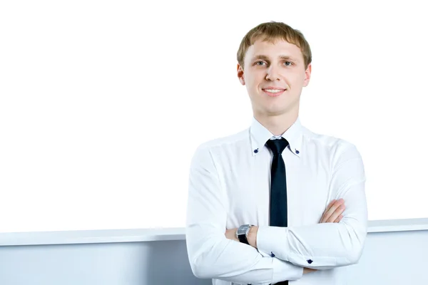 Friendly and smiling businessman looking at camera with reliabil — Stock Photo, Image
