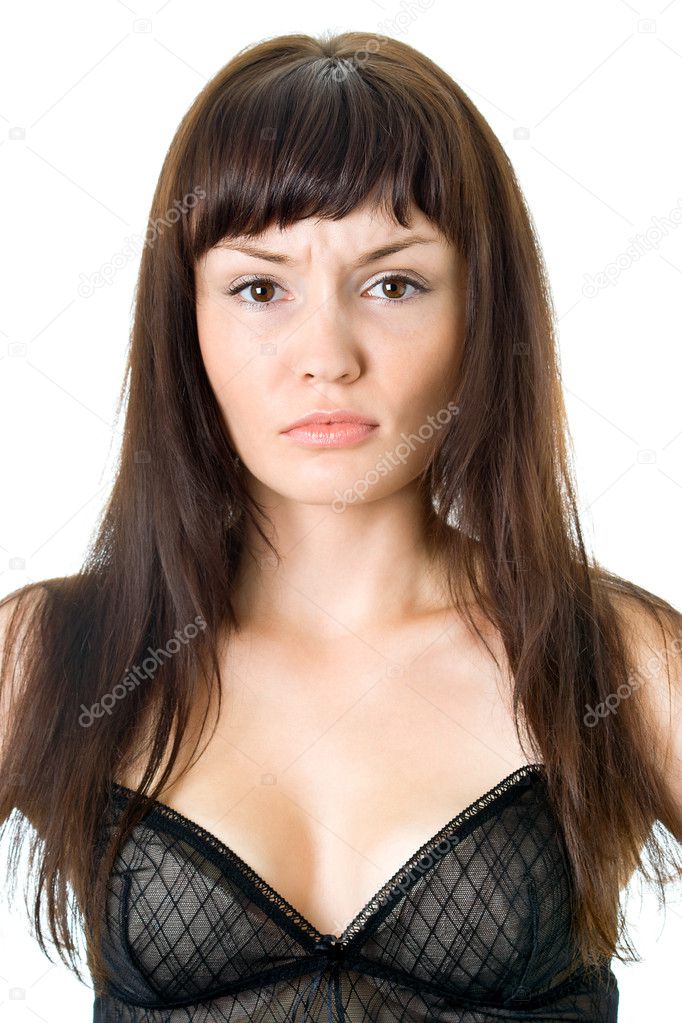 Beautiful young woman face. Black hair. Close up