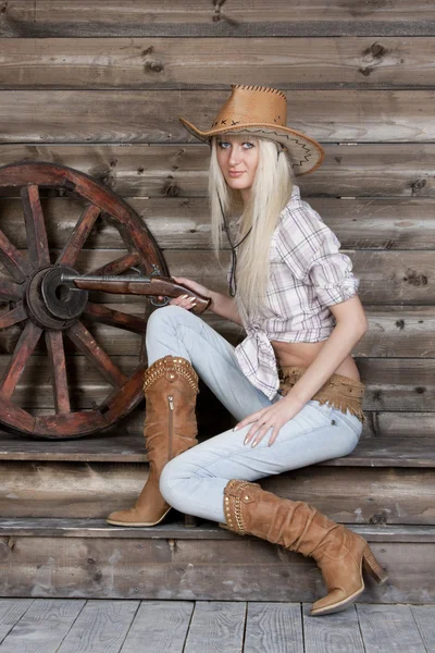 Uma menina em estilo country — Fotografia de Stock