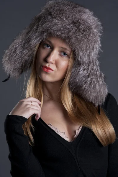 stock image Portrait of a beautiful girl in winter clothes