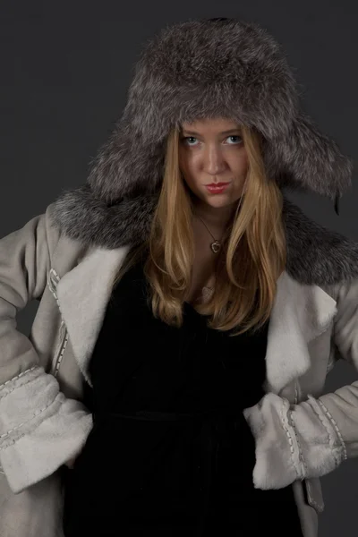 stock image Portrait of a beautiful girl in winter clothes