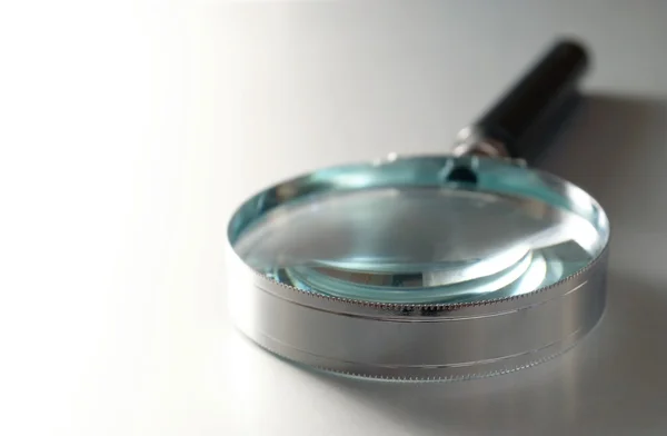 Magnifier with metal frame — Stock Photo, Image