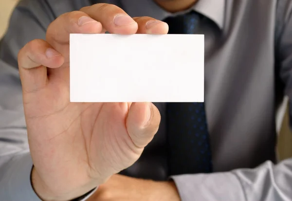 stock image Business card in hand, a businessman