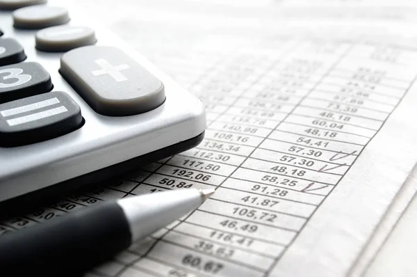 Calculator and workpapers — Stock Photo, Image