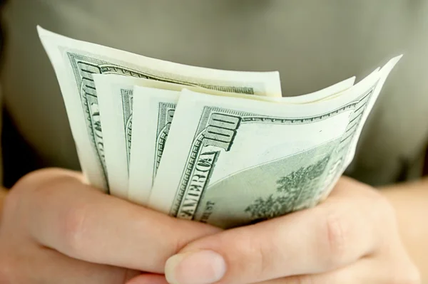 U.S. dollars in the hand — Stock Photo, Image