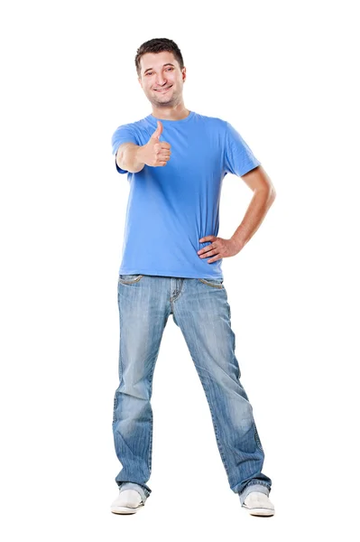 Full length portrait of young man showing thumbs up — Stock Photo, Image