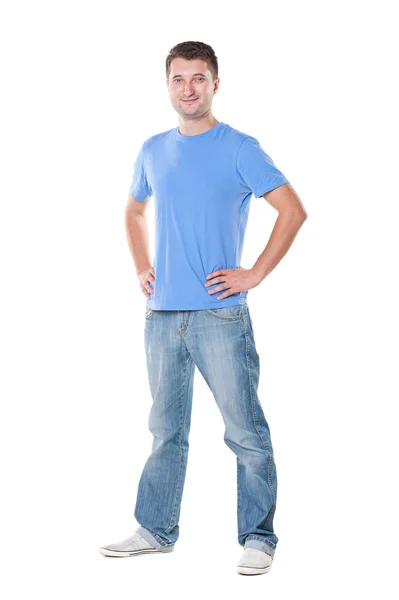 Homme en t-shirt bleu debout sur blanc — Photo