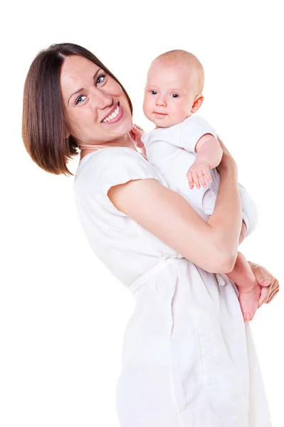 Mujer feliz sosteniendo a su bonito bebé —  Fotos de Stock