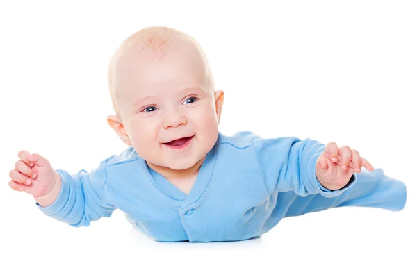 Laughing baby lying on belly — Stock Photo, Image