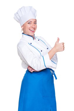 Cheerful young cook showing thumbs up