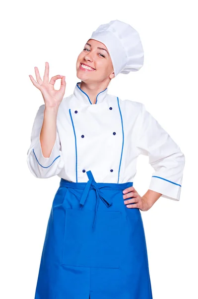 Sorridente jovem cozinheiro mostrando sinal ok — Fotografia de Stock
