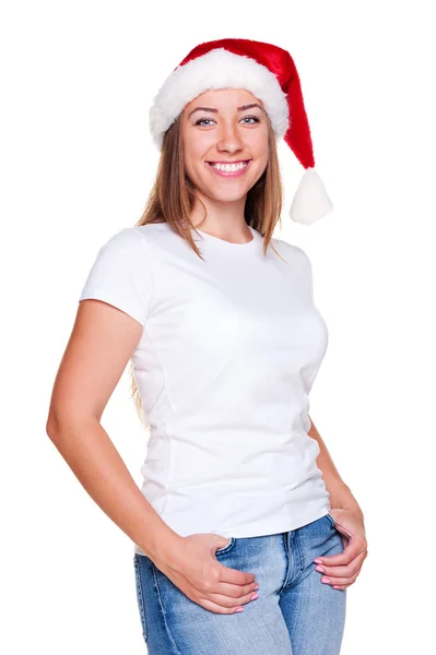 Kvinna i santa hatt poserar Stockfoto
