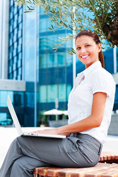 Successful student with laptop — Stock Photo, Image