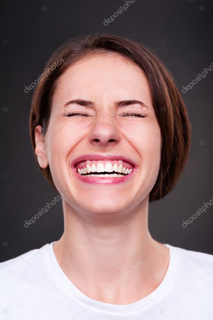 Woman is laughing loudly