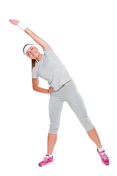 Aktywna młoda kobieta robi ćwiczenia — Zdjęcie stockowe