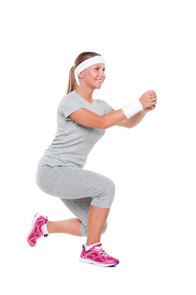 Smiley kvinna gör aerobics — Stockfoto