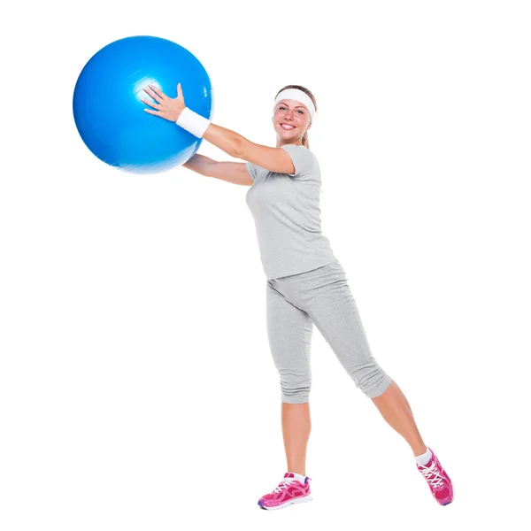 Smiley woman training with ball — Stock Photo, Image