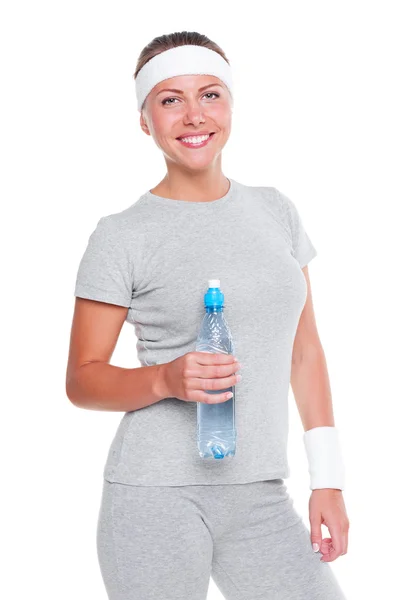 Frau hält Flasche Wasser in der Hand — Stockfoto