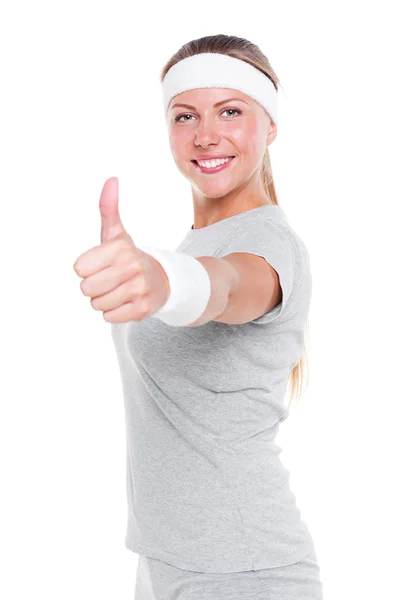 Mulher mostrando polegares para cima e sorrindo — Fotografia de Stock