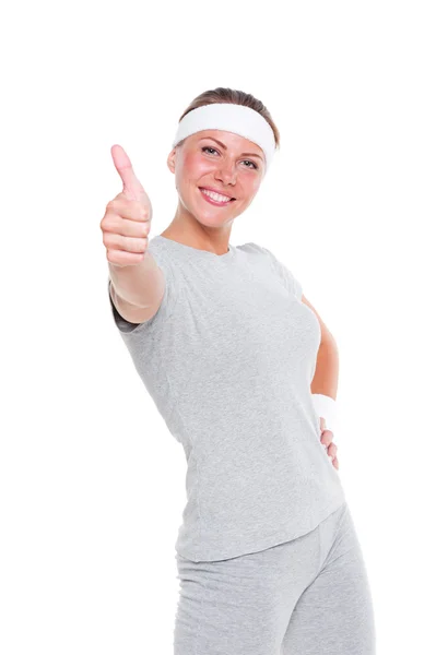 Fitness woman showing thumbs up — Stock Photo, Image