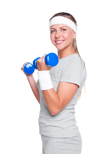 Woman posing with blue dumbbells — Stock Photo, Image