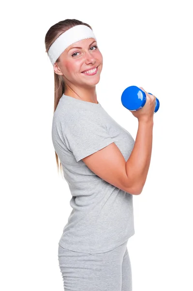女性の上腕二頭筋のための演習を行う — ストック写真
