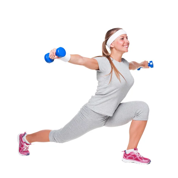 Женщина делает упражнения с весом — стоковое фото