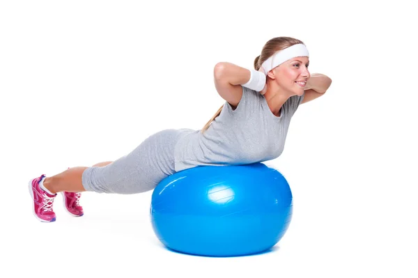 Young woman doing exercises — Stock Photo, Image